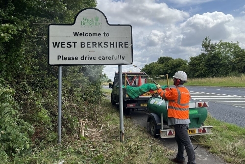 2024 - Cllr Gourley sign cleaning West Berkshire sign