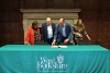 Tim Parry, CEO of Connecting Communities in Berkshire, signing the Memorandum of Understanding.
